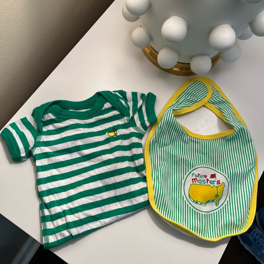 Baby 6 month old onesie and bib. Masters apparel. Bib never used Onesie use once